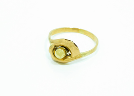 Dámský prsten v kombinaci žlutého a červeného zlata s kuličkou